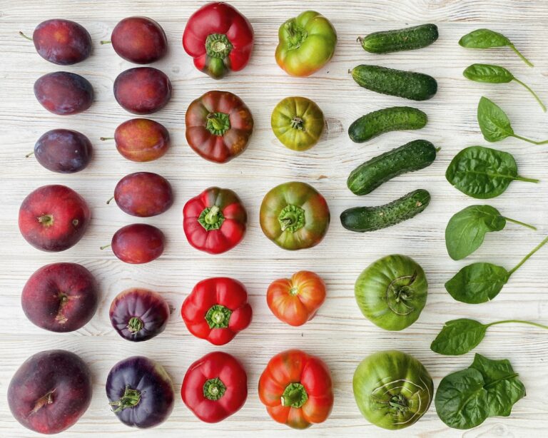 a bunch of different types of vegetables on a table